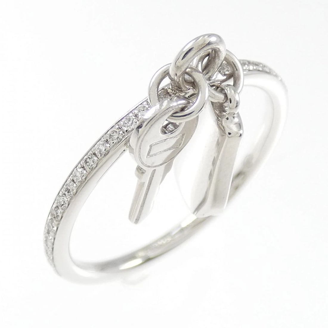 HERMES KELLY CLOCHETTE RING: HERMES Kelly Clochette Ring Brand: HERMES Type: Ring Material: 750 white gold, Main Stone/Creation Natural Color: White Size: US 8.25 Accessories: None Accessories Notice: When purchasing