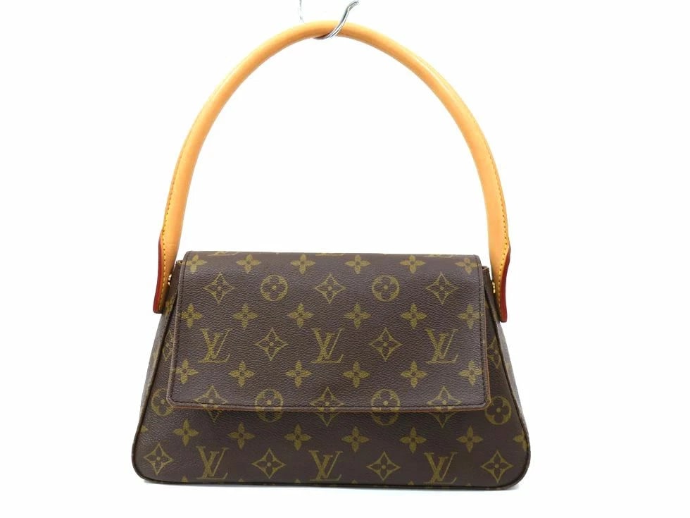 LOUIS VUITTON MONOGRAM MINI LOOPING HANDBAG HANDBAG: Louis Vuitton Monogram Mini Looping Handbag Handbag Brand: Louis Vuitton Type: Handbag Material: Monogram Color: none Size: D 27 x H 16 x G 4.5cm / Handle circumference 50cm Accessories: None