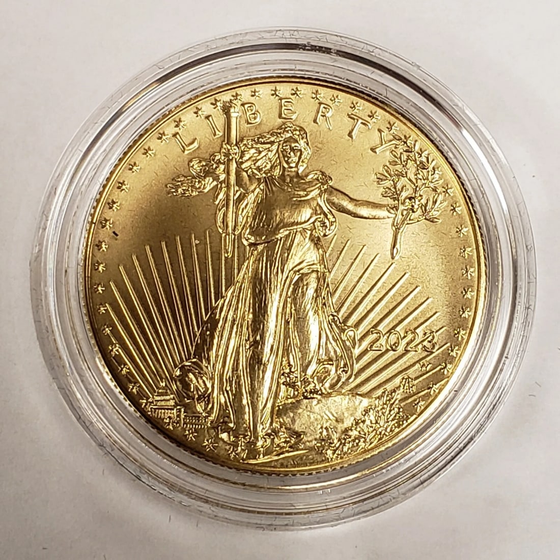 2023 $50 1 OZ GOLD AMERICAN EAGLE COIN: 2023 $50 1 oz Gold American Eagle Coin Brand/Mint: U.S. Mint Year: 2023 Fineness: 0.9167 Composition: Gold Coin: American Eagle Denomination: $50 Country of Origin: United States 