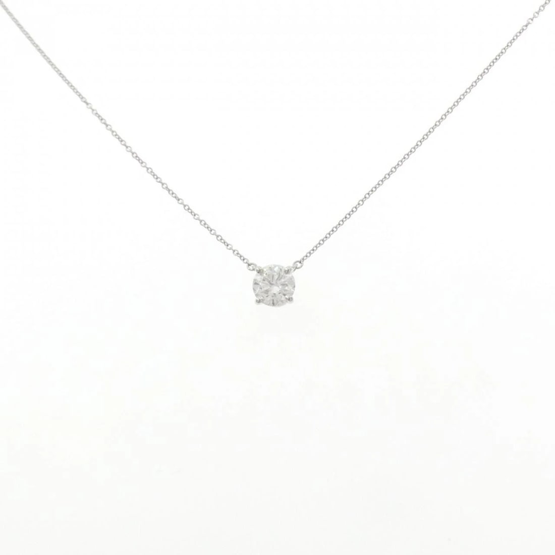 TIFFANY & CO. SOLITAIRE NECKLACE: Tiffany & Co. solitaire Necklace Brand: Tiffany Type: Necklace Material: Platinum 950, Main Stone/Creation Natural Color: Platinum Size: ActualSize Diameter: 6.8mm Chain Max. W: 1.0mm 
