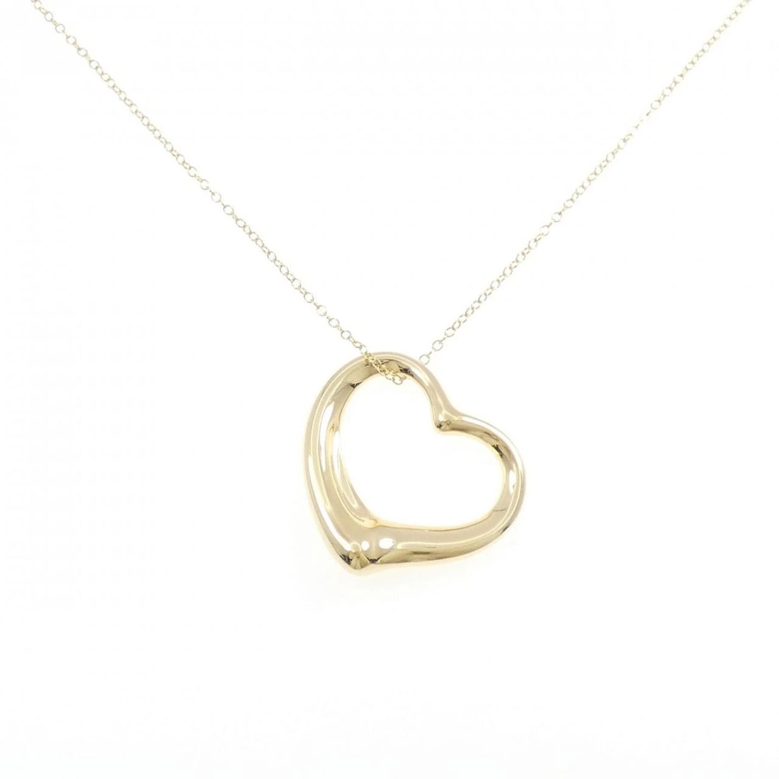 TIFFANY & CO. OPEN HEART NECKLACE: Tiffany & Co. Open Heart Necklace Brand: Tiffany Type: Necklace Material: 750 Yellow Gold, Color: Yellow Gold Size: ActualSize Pendant top H x W: 34.3mmx34.3mm Chain Max. W: 1.5mm Size77cm 