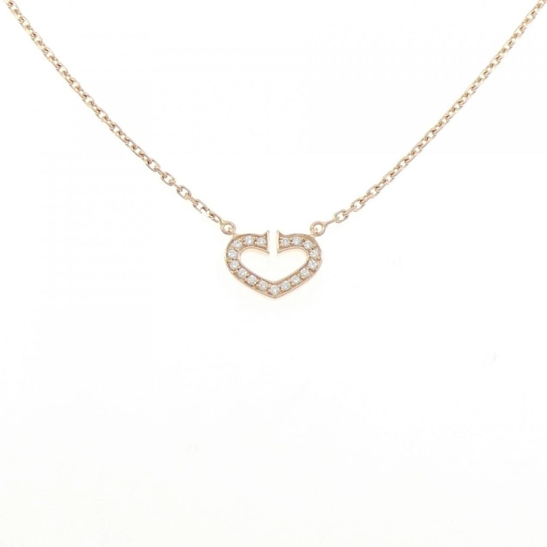 CARTIER C HEART NECKLACE: Cartier C Heart Necklace Brand: Cartier Type: Necklace Material: 750 Pink Gold, Main Stone/Creation Natural Color: Pink Gold Size: ActualSize Pendant top H x W: 8.7mmx12.1mm Chain Max. W: