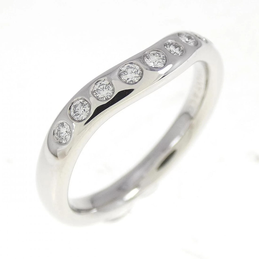 TIFFANY WIDE CURVED RING: Tiffany Wide curved Ring Brand: Tiffany Type: Ring Material: Platinum, Main Stone/Creation Natural Color: White Size: 4.5 (US size) Accessories: None Accessories Notice: When purchasing pr