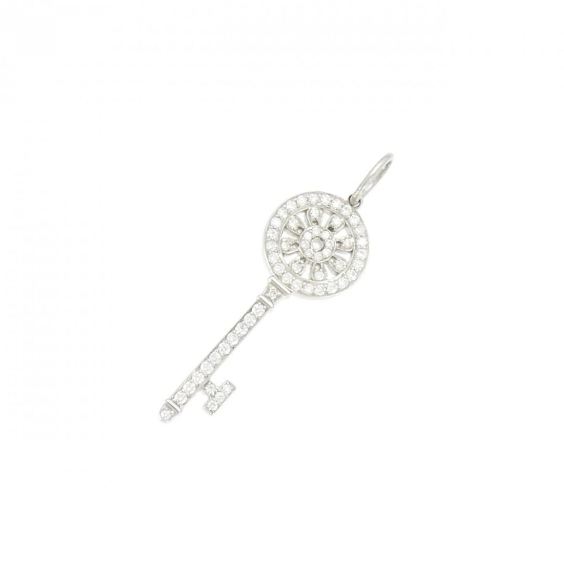 TIFFANY PETAL KEY PENDANT: Tiffany Petal Key Pendant Brand: Tiffany Type: Pendant Brooch Material: Platinum 950, Main Stone/Creation Natural Color: Platinum Size: ActualSize HxW: 29.4mmx8.9mm Accessories: None