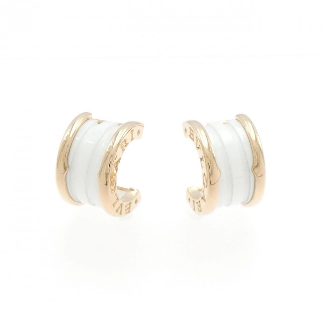 BVLGARI B.ZERO1 EARRINGS: BVLGARI B.zero1 Earrings Brand: BVLGARI Type: Earrings Material: 750 Pink Gold ceramic, Color: Pink Gold ceramic Size: ActualSize HxW: 14.7mmx9.3mm Accessories: None Accessories Notice: When