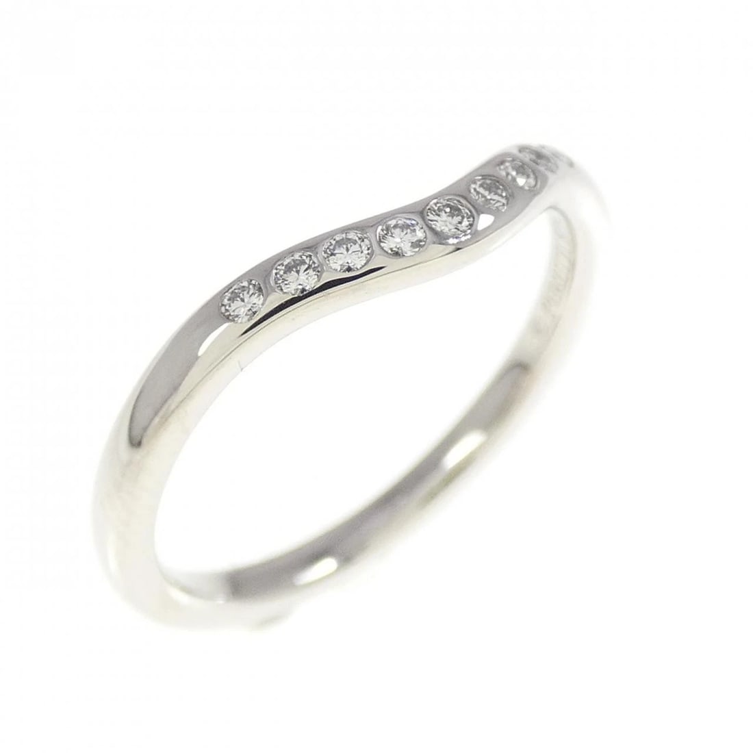 TIFFANY CURVED 9P RING: Tiffany Curved 9P Ring Brand: Tiffany Type: Ring Material: Platinum 950, Main Stone/Creation Natural Color: White Size: 5 (US size) Accessories: None Accessories Notice: When purchasing
