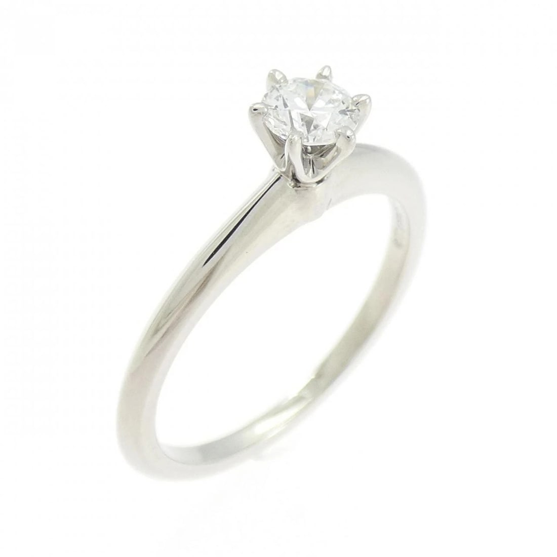 TIFFANY CLASSIC SOLITAIRE RING: Tiffany Classic Solitaire Ring Brand: Tiffany Type: Ring Material: Platinum 950, Main Stone/Creation Natural Color: White Size: 6 (US size) Accessories: None Accessories Notice: When purch