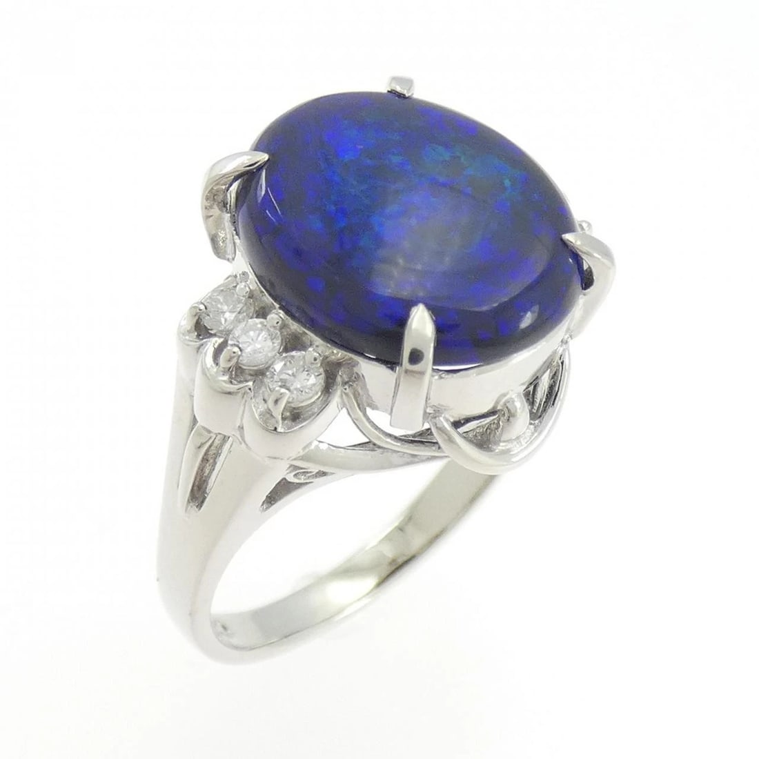PT900 BLACK OPAL RING: PT900 Black Opal Ring Brand: Unbranded Type: Ring Material: Platinum 900, Main Stone/Creation Black OpalSide Stone Natural Color: Silver Size: 6 (US size) Accessories: None Accessories