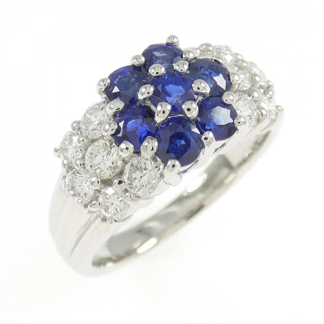 PT900 FLOWER SAPPHIRE RING: PT900 Flower Sapphire Ring Brand: Unbranded Type: Ring Material: Platinum 900, Main Stone/Creation SapphireSide Stone Natural Color: Silver Size: 5.5 (US size) Accessories: None Accessorie