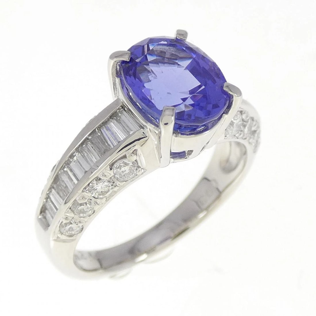 PT900 TANZANITE RING: PT900 Tanzanite Ring Brand: Unbranded Type: Ring Material: Platinum 900, Main Stone/Creation Tanzanite Color: platinum Size: 6.5US Accessories: None Accessories Notice: When purchasing pre