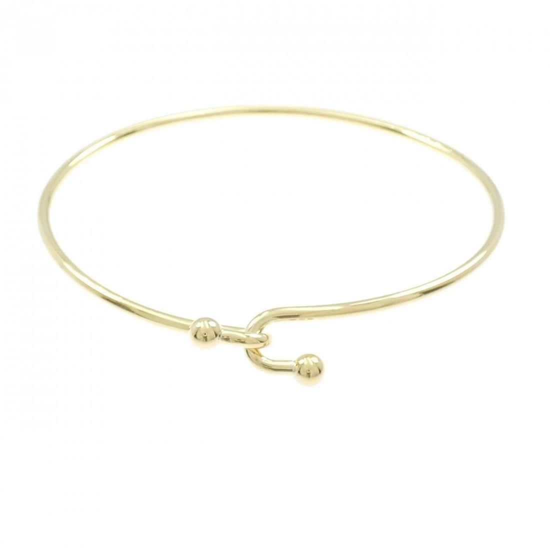 TIFFANY 750YG BANGLE: Tiffany 750YG Bangle Brand: Tiffany Type: Bracelet Material: 750 Yellow Gold, Color: Yellow Gold Size: 17cm,ActualSize Max W: 7.5mm Accessories: None Accessories Notice: When purchasing