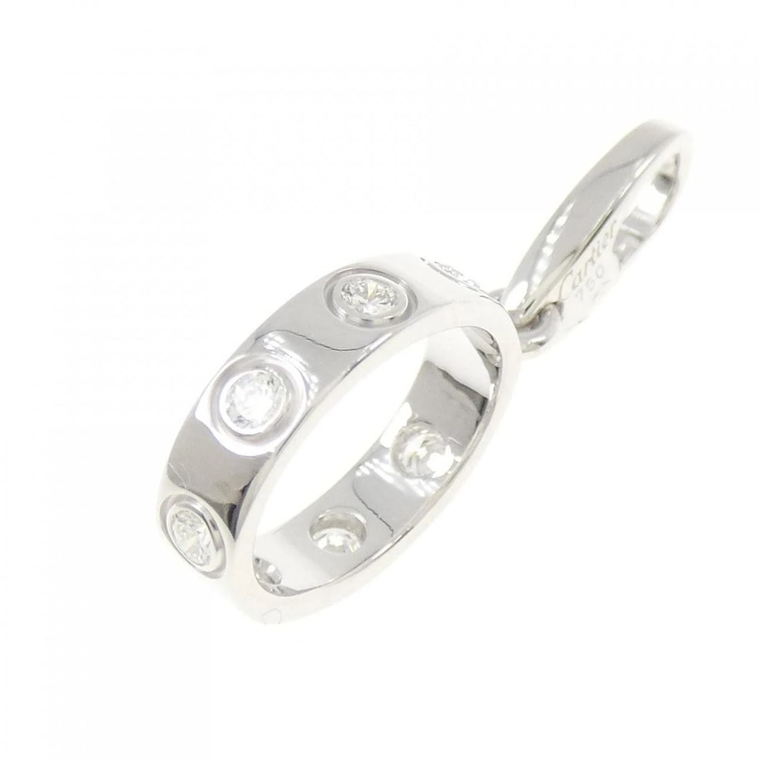 CARTIER LOVE CHARM: Cartier Love Charm Brand: Cartier Type: Pendant Brooch Material: 750 White Gold, Main Stone/Creation Natural Color: white gold Size: ActualSize HxW: 24.6mmx3.3mm Accessories: None Accessories