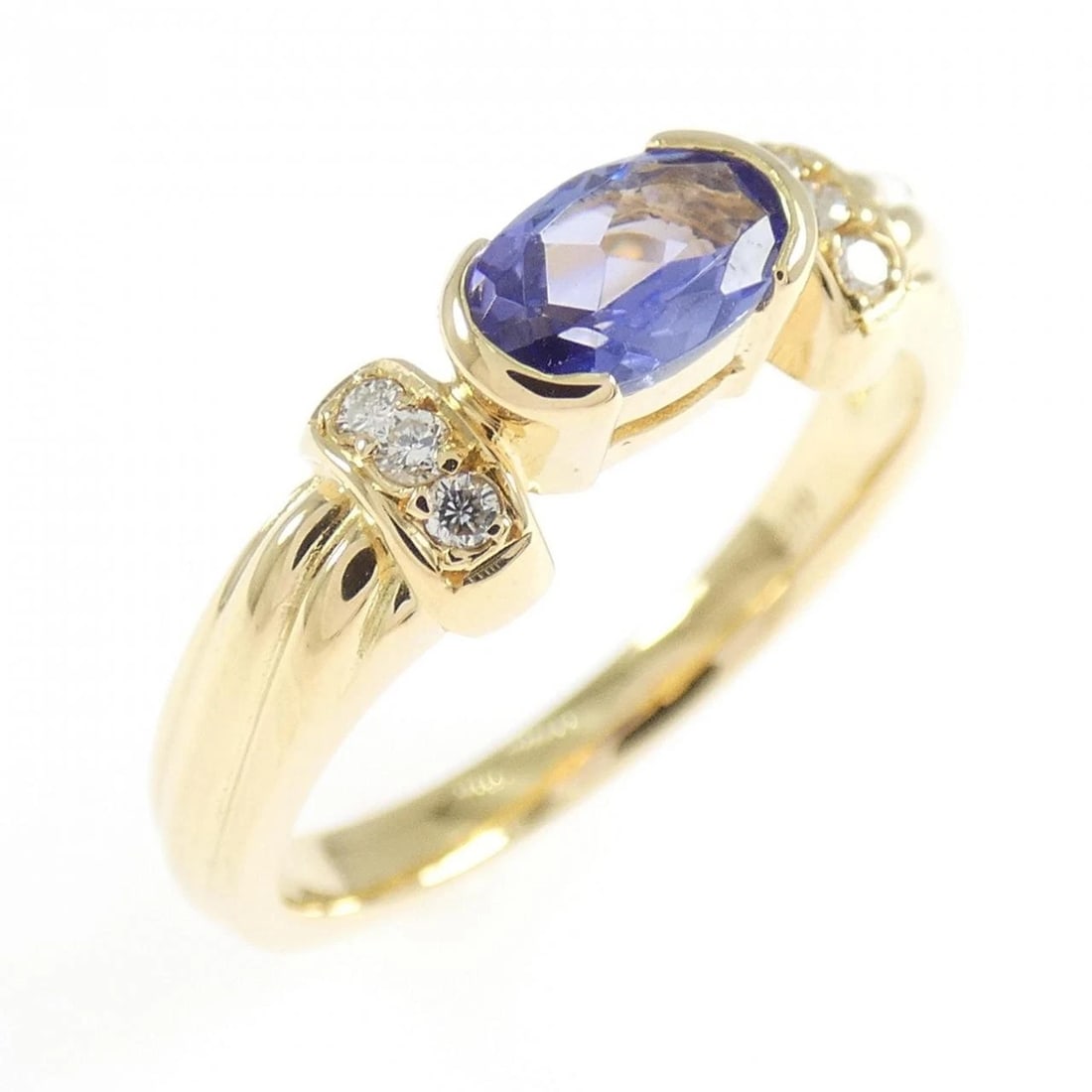 K18YG TANZANITE RING: K18YG Tanzanite Ring Brand: Unbranded Type: Ring Material: K18 Yellow Gold, Main Stone/Creation Tanzanite Color: yellow gold Size: 6US Accessories: None Accessories Notice: When purchasing