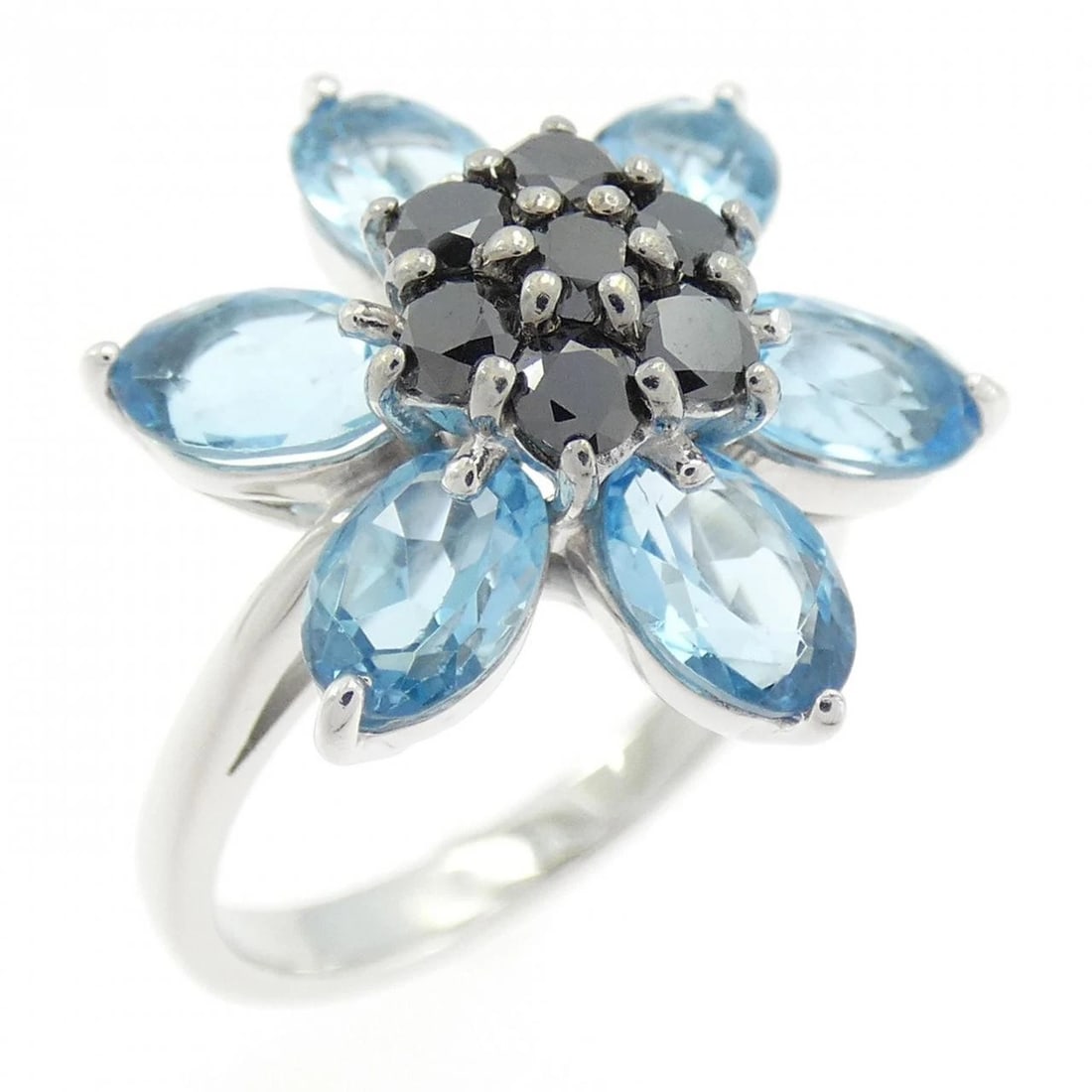 K18WG FLOWER BLUE TOPAZ RING: K18WG Flower Blue Topaz Ring Brand: Unbranded Type: Ring Material: K18 White Gold, Main Stone/Creation blue topaz Color: white gold Size: 6US Accessories: None Accessories Notice: When