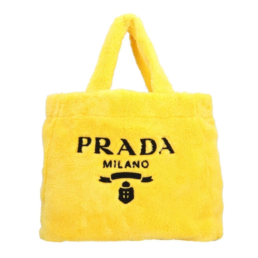 PRADA TOTE BAG PILE TERRY TOTE BAG: PRADA Tote Bag pile terry Tote Bag Brand: PRADA Type: Tote Bag Material: Exterior Material pile Color: yellow Size: W15.7 x H13.4 x D6.3inch Shoulder:17.7inch Accessories: None Accessories