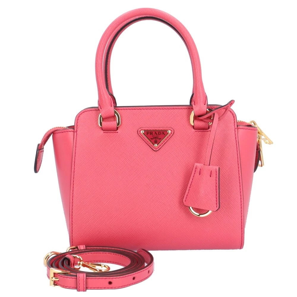 PRADA SHOULDER BAG CROSS BODY LEATHER 2WAY SAFIANO SHOULDER BAG: PRADA Shoulder Bag Cross Body leather 2way Safiano Shoulder Bag Brand: PRADA Type: Shoulder Bag Material: Exterior Material leather Color: pink Size: W7.1 x H5.9 x D3.1inch Handle:11.0inch