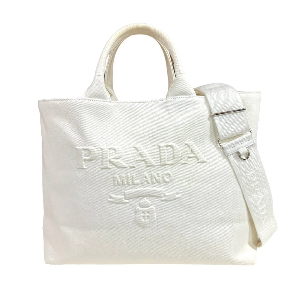 PRADA SHOULDER BAG CROSS BODY CANVAS 2WAY SHOULDER BAG: PRADA Shoulder Bag Cross Body canvas 2way Shoulder Bag Brand: PRADA Type: Shoulder Bag Material: Exterior Material canvas Color: white Size: W14.6 x H11.4 x D6.3inch Handle:12.2inch
