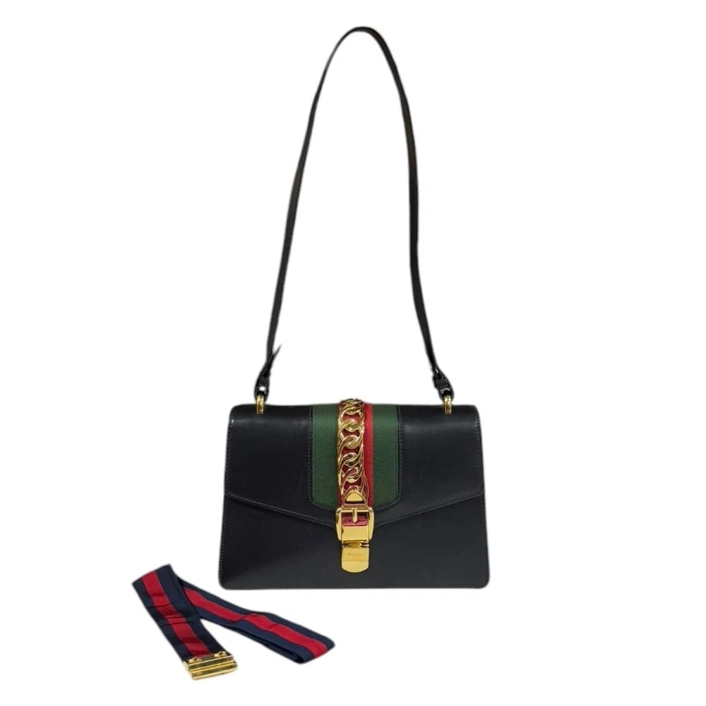 GUCCI SHOULDER BAG LEATHER SILVI SHOULDER BAG: GUCCI Shoulder Bag leather Silvi Shoulder Bag Brand: GUCCI Type: Shoulder Bag Material: Exterior Material leather Color: black Size: W9.8 x H6.5 x D2.8inch Shoulder:28.7inch Accessories: None