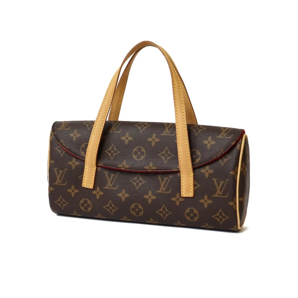 LOUIS VUITTON HANDBAG BROWN RED MONOGRAM CANVAS HANDBAG: LOUIS VUITTON Handbag Brown Red Monogram canvas Handbag Brand: LOUIS VUITTON Type: Handbag Material: Exterior Material Monogram canvas Color: Brown / Brown x Red Size: W11.4 x H5.9 x D2.0inch