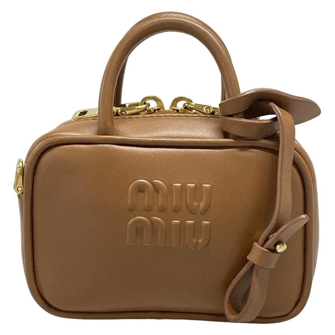 MIUMIU - BROWN LEATHER HANDBAG HANDBAG: miumiu - Brown Leather Handbag Handbag Brand: miumiu Type: Handbag Material: Leather Color: Brown Size: Height : 2.95 inch (7.5 cm) Width : 4.33 inch (11 cm) Depth : 1.77 inch (4.5 cm) Accessorie