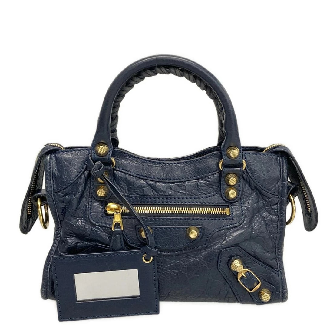 BALENCIAGA THE GIANT MINI CITY NAVY LEATHER HANDBAG HANDBAG: BALENCIAGA The Giant Mini City Navy Leather Handbag Handbag Brand: BALENCIAGA Type: Handbag Material: Leather Color: Navy Size: Height : 5.91 inch (15 cm) Width : 9.25 inch (23.5 cm) Depth : 3.15