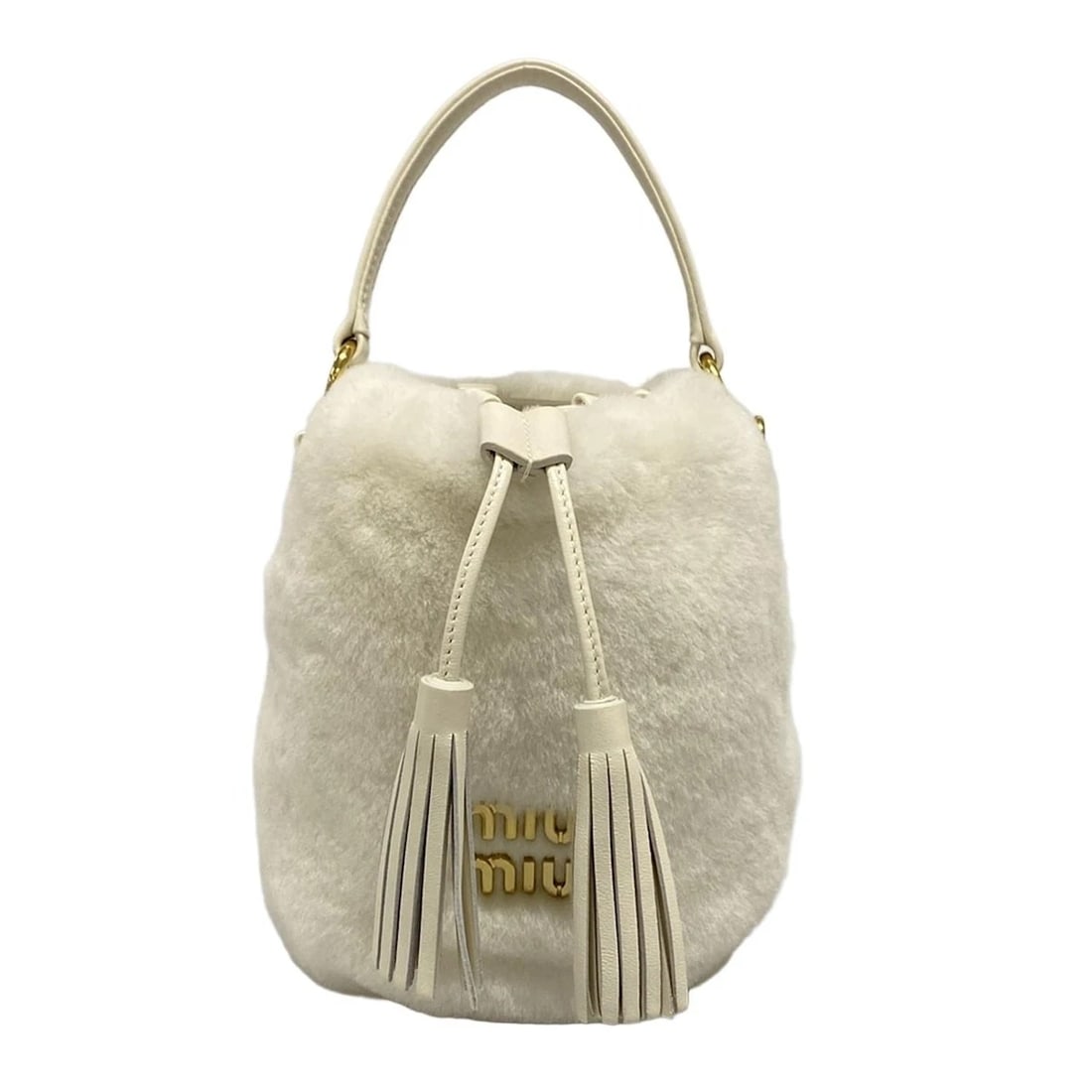 MIUMIU - WHITE SHEEP FUR LEATHER HANDBAG: miumiu - White Sheep Fur Leather Handbag Brand: miumiu Type: Handbag Material: Sheep Fur, Leather Color: White Size: Height : 7.28 inch (18.5 cm) Width : 6.3 inch (16 cm) Depth : 3.94 inch (10 cm)