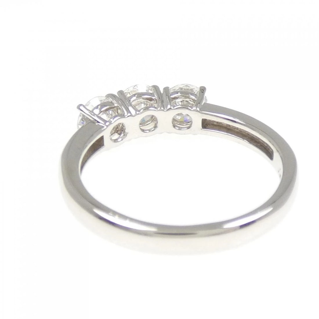 PT900 3 STONE DIAMOND RING: PT900 3 Stone Diamond Ring Brand: Unbranded Type: Ring Material: Platinum 900, Main Stone/Creation Natural Color: Silver Size: 6.5 (US size) Accessories: None Accessories Notice: When