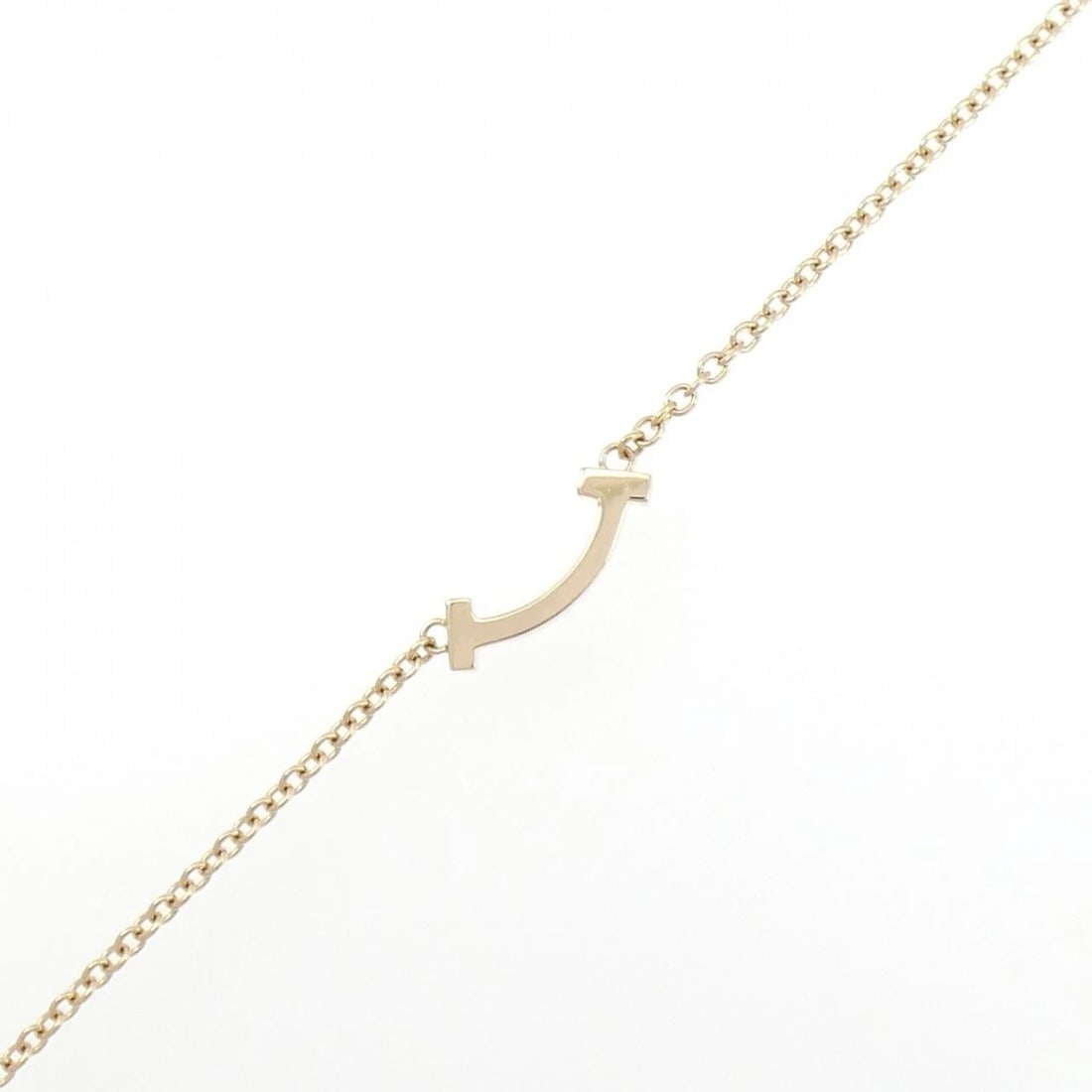 TIFFANY T SMILE MINI BRACELET: Tiffany T Smile mini Bracelet Brand: Tiffany Type: Bracelet Material: 750 Pink Gold, Color: Pink Gold Size: 16.5cm,ActualSize Max W: 4.5mm Accessories: None Accessories Notice: When