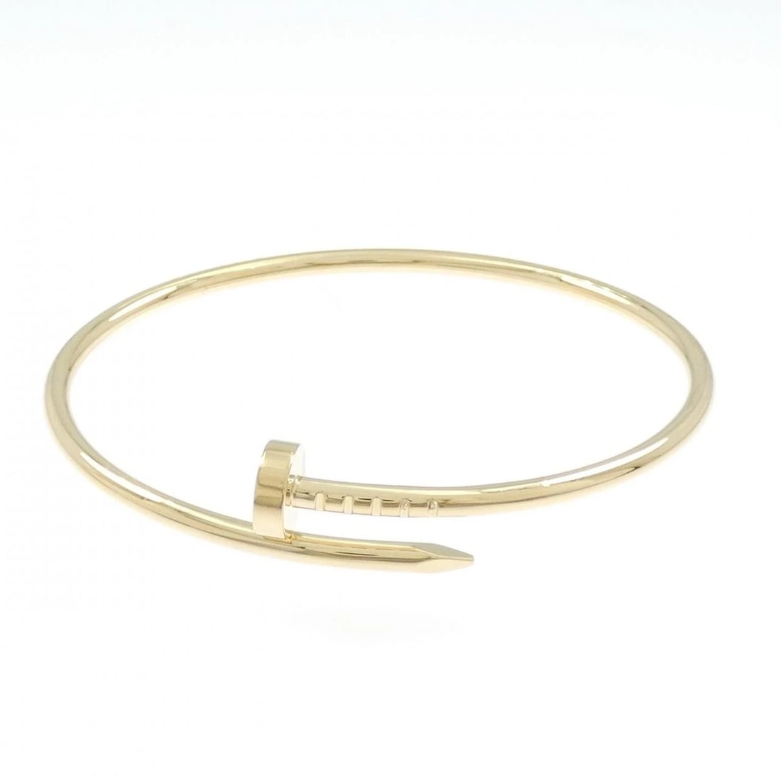 CARTIER JUSTE UN CLOU SMALL BANGLE: Cartier Juste Un Clou Small Bangle Brand: Cartier Type: Bracelet Material: 750 Yellow Gold, Color: Yellow Gold Size: 15cm,ActualSize Max W: 10.1mm Accessories: None Accessories Notice: When