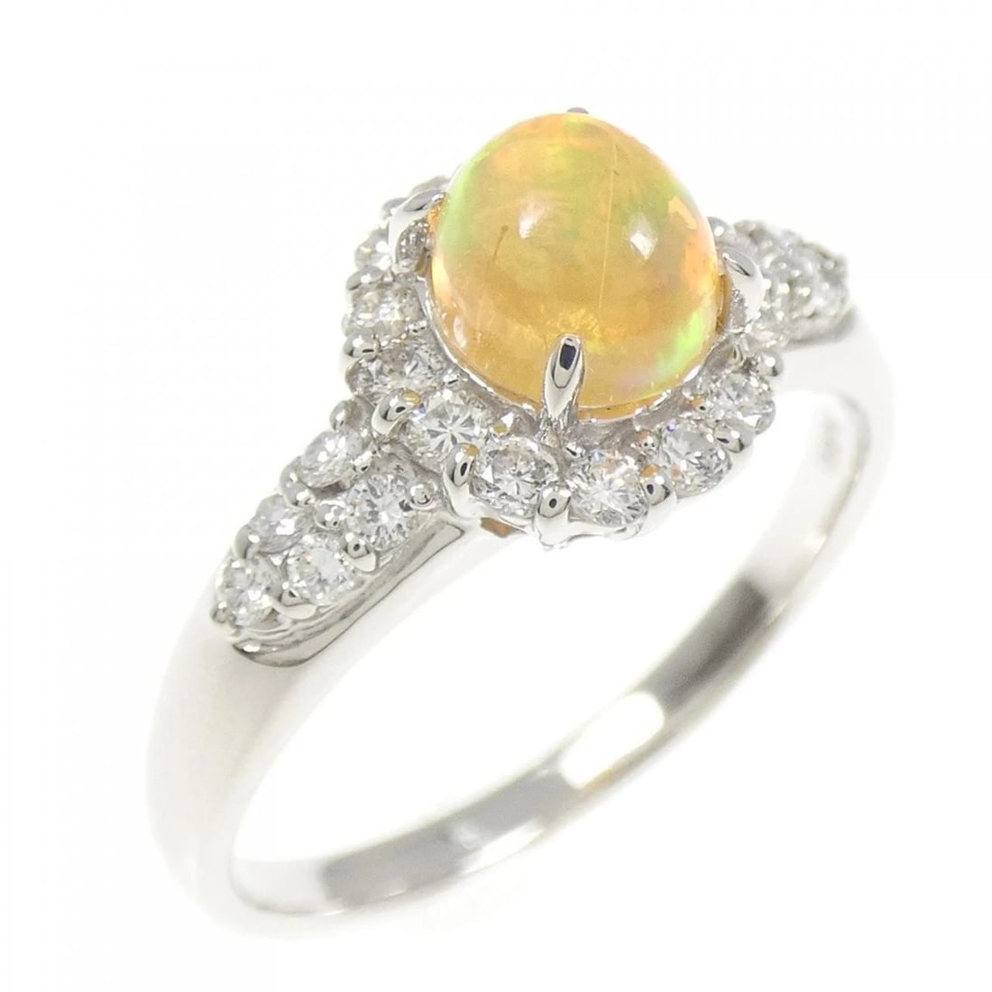 PT900 OPAL RING: PT900 Opal Ring Brand: Unbranded Type: Ring Material: Platinum 900, Main Stone/Creation OpalSide Stone Natural Color: Silver Size: 9 (US size) Accessories: None Accessories Notice: When