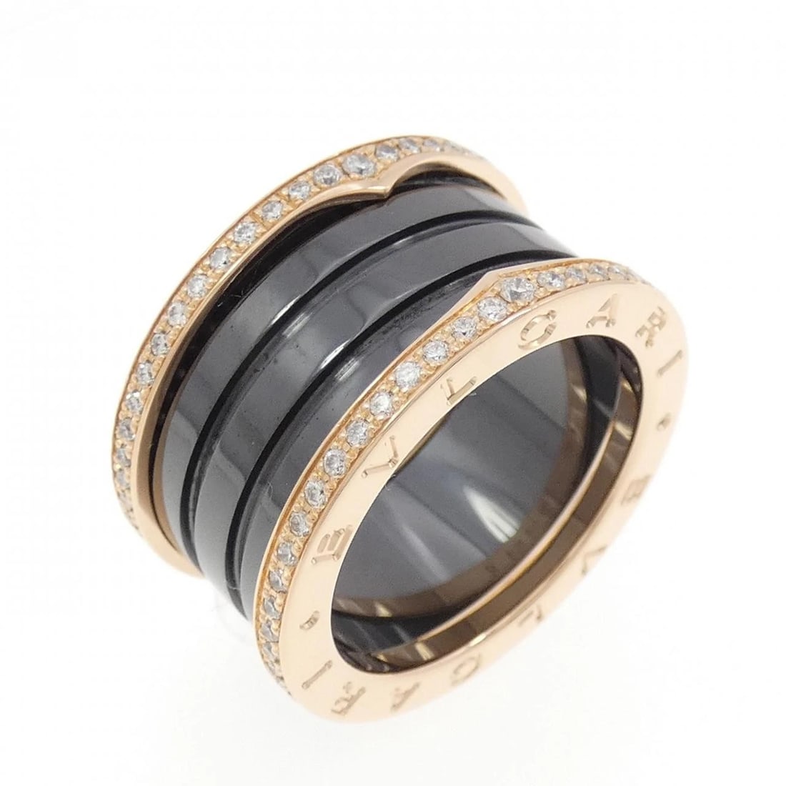 BVLGARI B.ZERO1 4 BANDS RING: BVLGARI B.zero1 4 Bands Ring Brand: BVLGARI Type: Ring Material: 750 Pink Gold ceramic, Main Stone/Creation Natural Color: Pink Gold ceramic Size: 6.5-7 (US size) Accessories: None