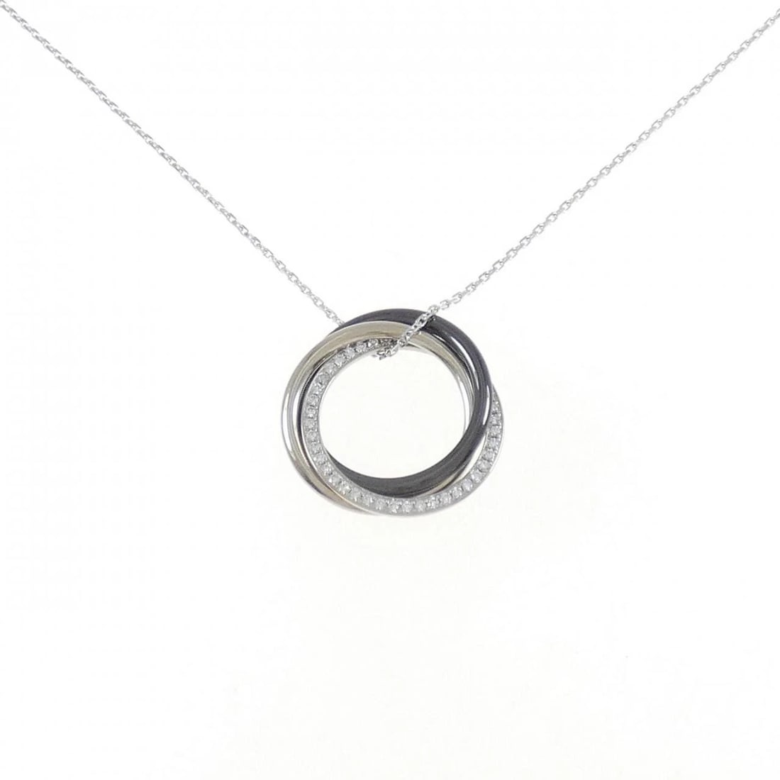 CARTIER TRINITY BLACK AND WHITE NECKLACE: Cartier Trinity Black and White Necklace Brand: Cartier Type: Necklace Material: 750 White Gold ceramic, Main Stone/Creation Natural Color: None Size: 42 45cm,ActualSize Pendant top H x W: