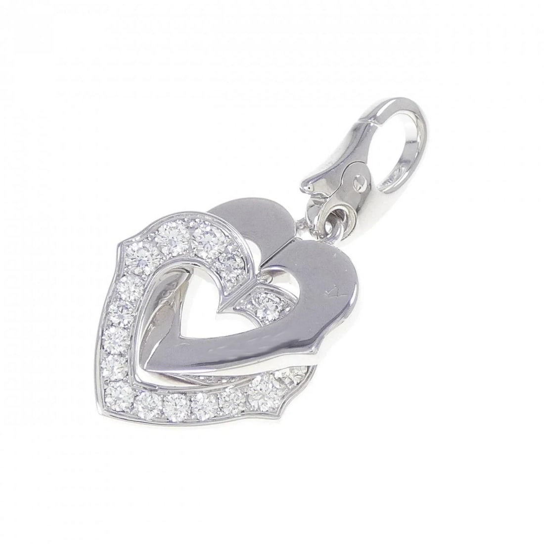 CARTIER HEART MOTIF PENDANT: Cartier Heart Motif Pendant Brand: Cartier Type: Pendant Brooch Material: 750 White Gold, Main Stone/Creation Natural Color: White Gold Size: ActualSize HxW: 27.5mmx13.5mm Accessories: None
