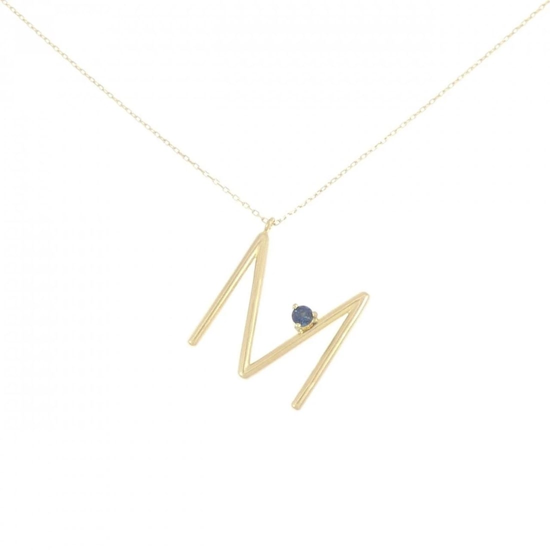 K18YG INITIAL M SAPPHIRE NECKLACE: K18YG Initial M Sapphire Necklace Brand: Unbranded Type: Necklace Material: K18 Yellow Gold, Main Stone/Creation Sapphire Color: Yellow Gold Size: 45cmActualSize Pendant top H x W: