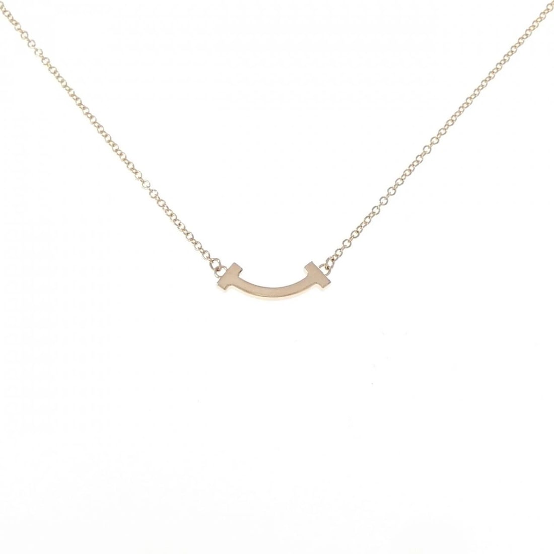 TIFFANY T SMILE MINI NECKLACE: Tiffany T Smile mini Necklace Brand: Tiffany Type: Necklace Material: 750 Pink Gold, Color: Pink Gold Size: 41/46cm,ActualSize Pendant top H x W: 4.5mmx13.9mm Chain Max. W: 1.1mm Accessories: