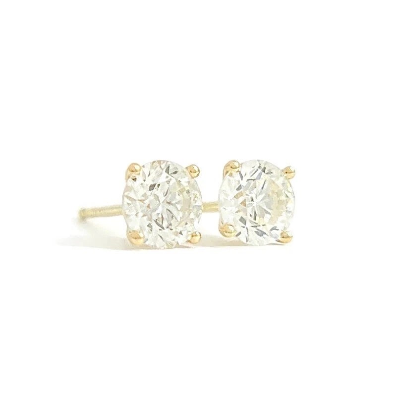 ROUND DIAMOND STUD EARRINGS 14K YELLOW GOLD: Round Diamond Stud Earrings 14K Yellow Gold Brand: Unbranded Type: Earrings Material: 14K Yellow Gold, Main Stone/Creation Natural Color: White Size: Measurements: 4.9 mm Accessories: None