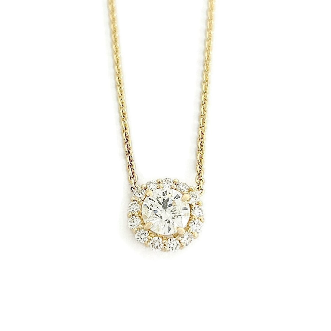 ROUND DIAMOND HALO PENDANT NECKLACE: Round Diamond Halo Pendant Necklace Brand: Unbranded Type: Necklace Material: 14K Yellow Gold, Main Stone/Creation Natural Color: Gold Size: Length: 16 inches Pendant: 9.7 mm Accessories: