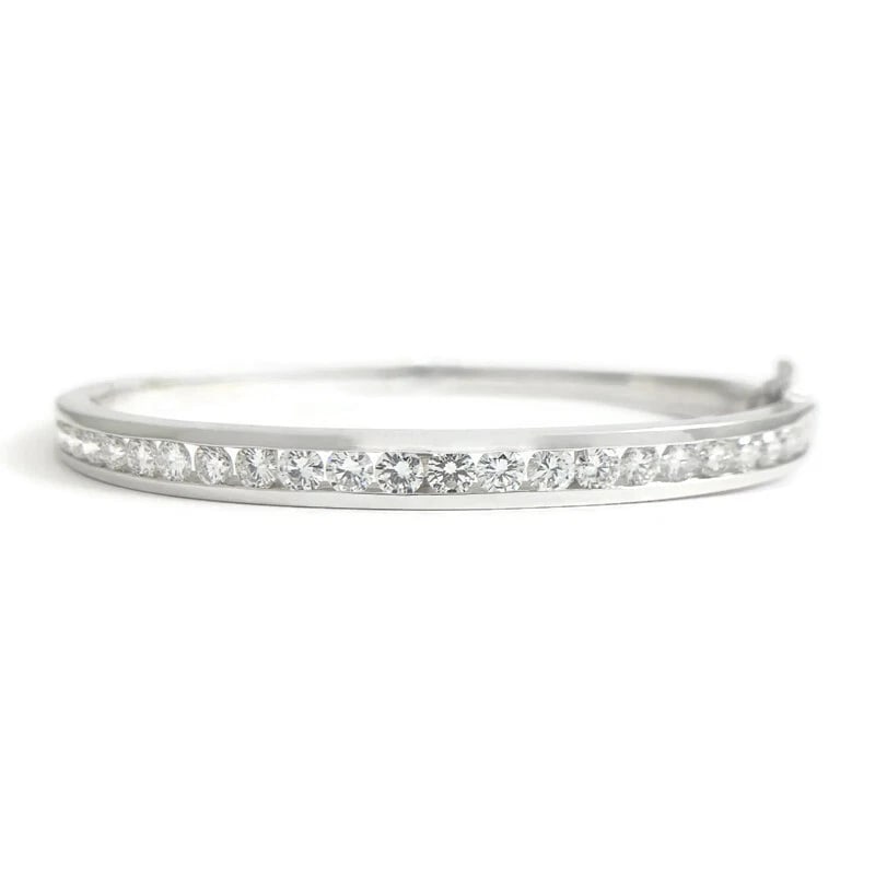 ROUND DIAMOND CHANNEL-SET BANGLE BRACELET 14K WHITE GOLD: Round Diamond Channel-Set Bangle Bracelet 14K White Gold Brand: Unbranded Type: Bracelet Material: 14K White Gold, Main Stone/Creation Natural Color: Silver Size: Length: 7 inches Width: 4.9 mm at
