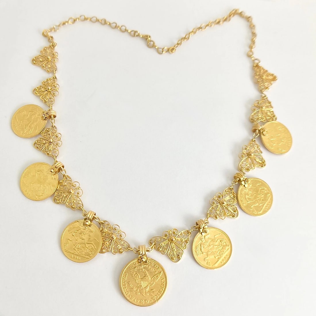 VINTAGE ANTIQUE COIN BUTTERFLY CHAIN NECKLACE: Vintage Antique Coin Butterfly Chain Necklace Brand: Unbranded Type: Necklace Material: 22K Yellow Gold, Color: Gold Size: Length: 20 inches Width: 21.7 mm Accessories: None Accessories