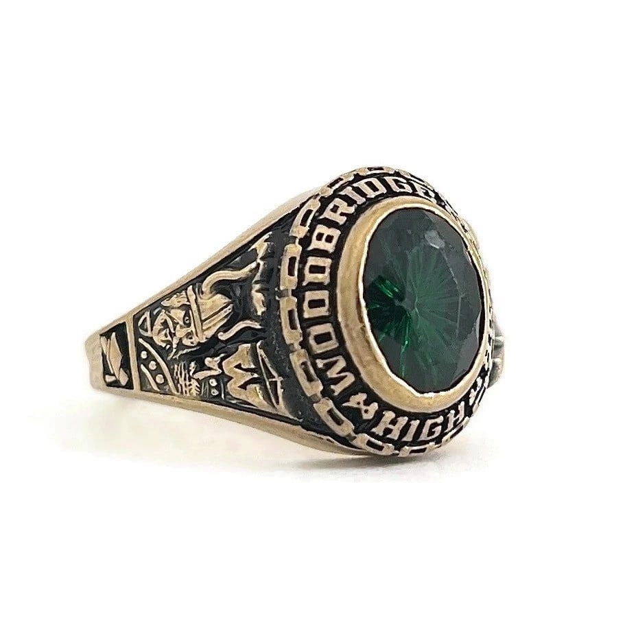 WOODBRIDGE SENIOR HIGH GREEN TOURMALINE CLASS RING: Woodbridge Senior High Green Tourmaline Class Ring Brand: Estate Type: Ring Material: 10K yellow gold, Main Stone/Creation Tourmaline Color: Gold Size: 6.5 US Accessories: None Accessories