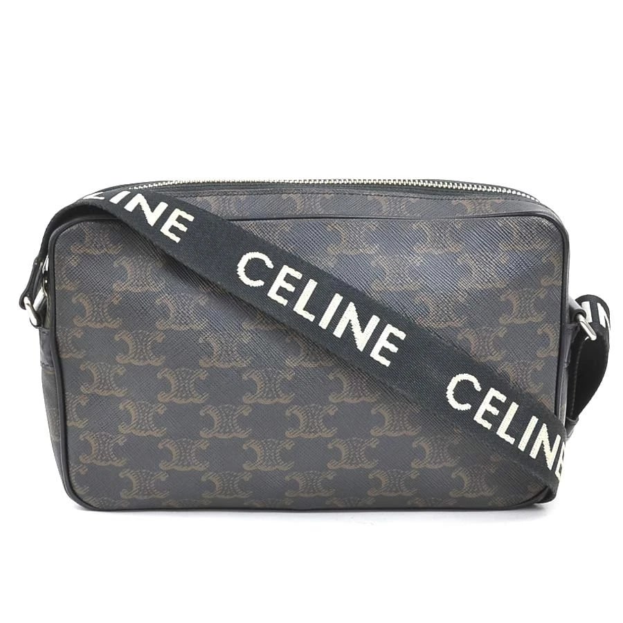 CELINE SHOULDER BAG BROWN/BLACK PVC SHOULDER BAG: CELINE Shoulder Bag Brown/Black PVC Shoulder Bag Brand: CELINE Type: Shoulder Bag Material: PVC coated canvas Color: Brown X Black Size: W:8.9inx H:5.5inx D:2.0in Shoulder Length:?Max? 50.8in Acc