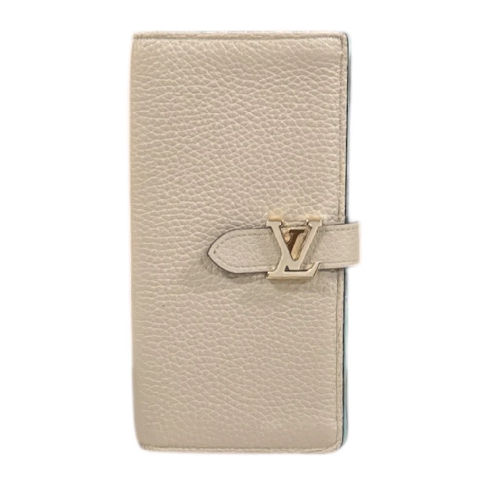 LOUIS VUITTON PURSE LEATHER VERTICAL WALLET PURSE: LOUIS VUITTON purse leather Vertical Wallet purse Brand: LOUIS VUITTON Type: purse Material: Exterior Material leather Color: beige / Galle Size: W3.7 x H7.5x D0.6inch Accessories: None