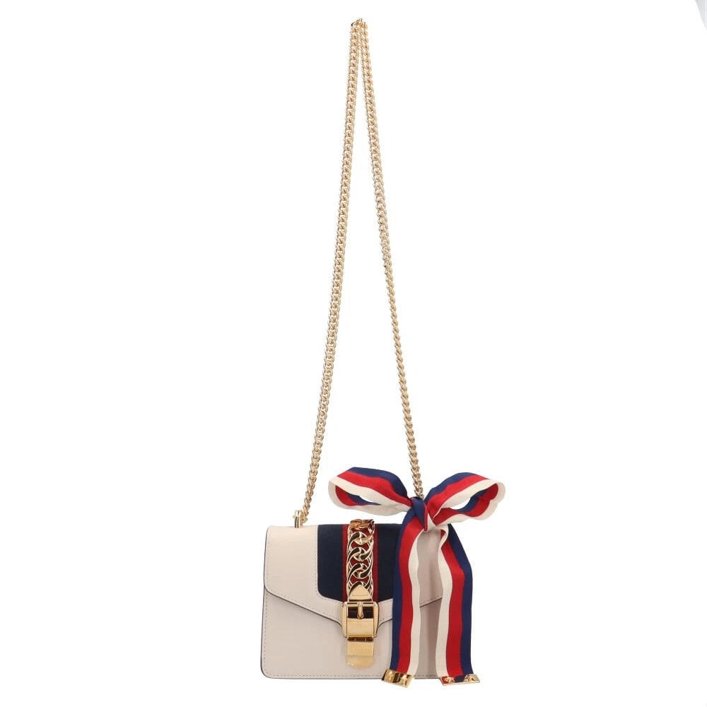 GUCCI SHOULDER BAG LEATHER CHAINSHOULDER SILVI SHOULDER BAG: GUCCI Shoulder Bag leather ChainShoulder Silvi Shoulder Bag Brand: GUCCI Type: Shoulder Bag Material: Exterior Material leather Color: white / Navy x Red Size: W7.3 x H5.5 x D3.0inch