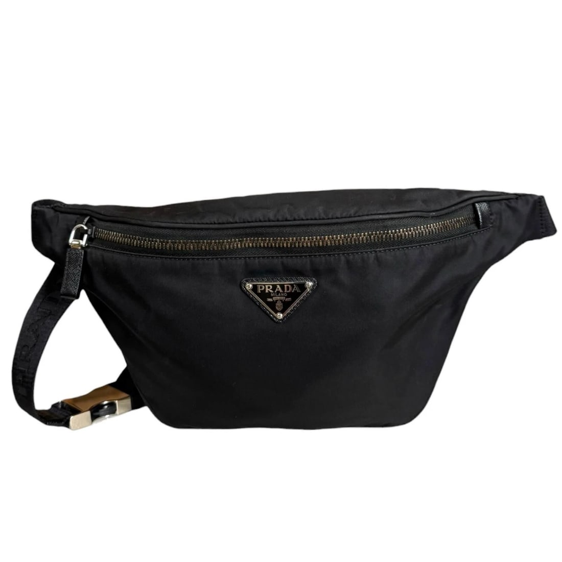 PRADA SLING BAG RENYLON SAFFIANO LEATHER BELT BAG SLING BAG: PRADA Sling Bag Renylon Saffiano leather belt bag Sling Bag Brand: PRADA Type: Sling Bag Material: Exterior Material Renylon Color: black / Nero Size: W7.9 x H6.7 x D2.8inch Accessories: None