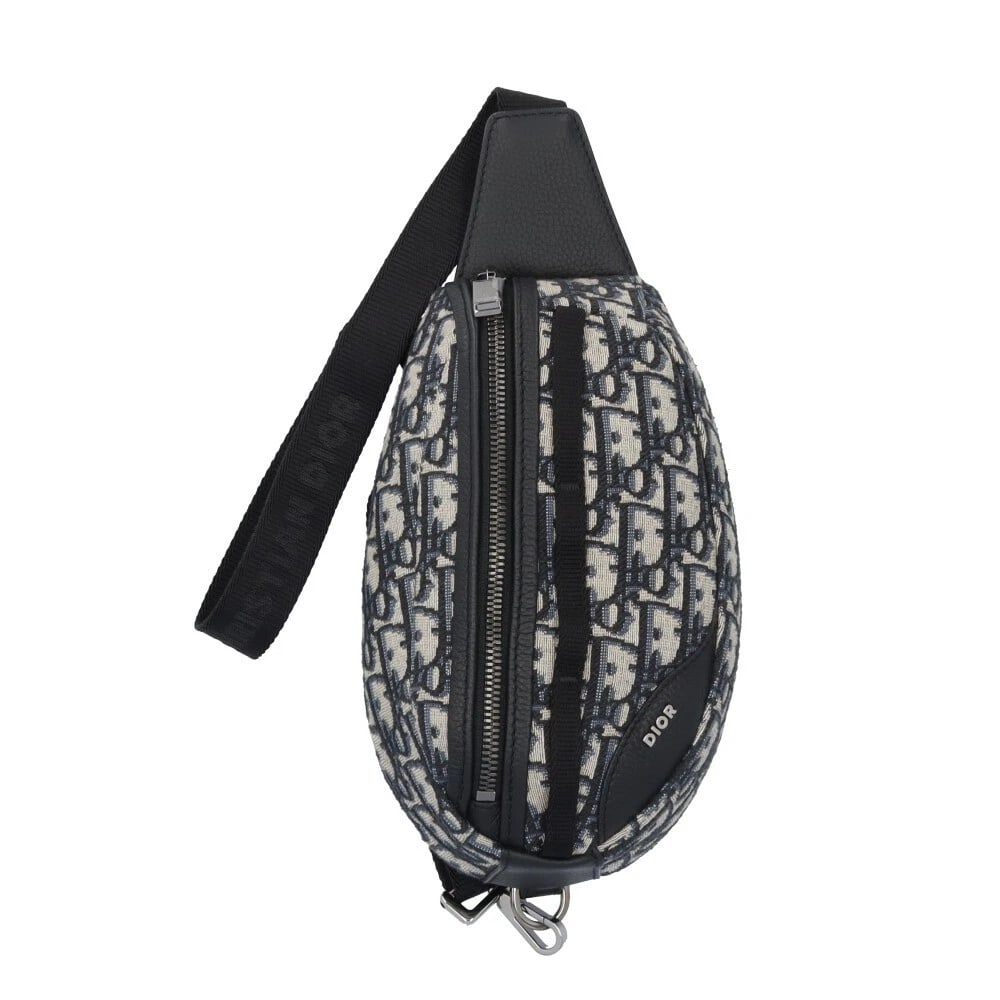 DIOR SLING BAG LEATHER SCARAB SLING BAG: Dior Sling Bag leather Scarab Sling Bag Brand: Dior Type: Sling Bag Material: Exterior Material leather Color: beige / black Size: W11.0 x H5.1 x D2.4inch Shoulder:27.6inch Accessories: None <