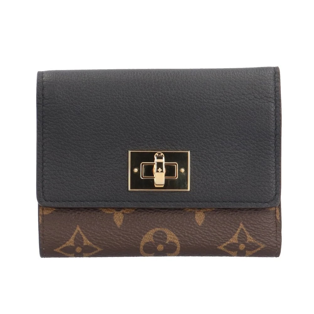 LOUIS VUITTON TRI-FOLD WALLET MONOGRAM CANVAS TRI-FOLD WALLET: LOUIS VUITTON Tri-fold wallet Monogram canvas Tri-fold wallet Brand: LOUIS VUITTON Type: Tri-fold wallet Material: Exterior Material Monogram canvas Color: Brown / black Size: W4.7 x H3.7x