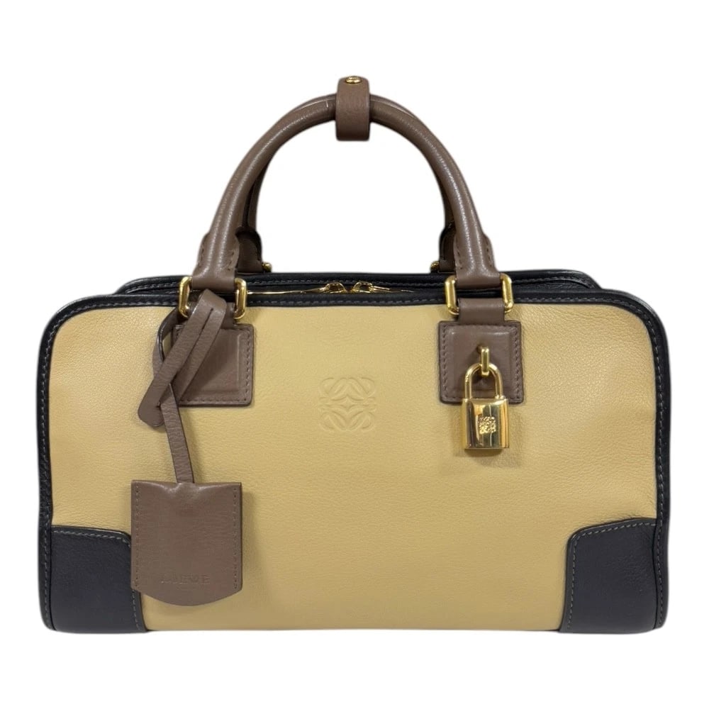 LOEWE HANDBAG LEATHER AMERICANA 28 HANDBAG: LOEWE Handbag leather Americana 28 Handbag Brand: LOEWE Type: Handbag Material: Exterior Material leather Color: beige / black Size: W11.4 x H6.3 x D5.1inch Handle:10.6inch Accessories: None