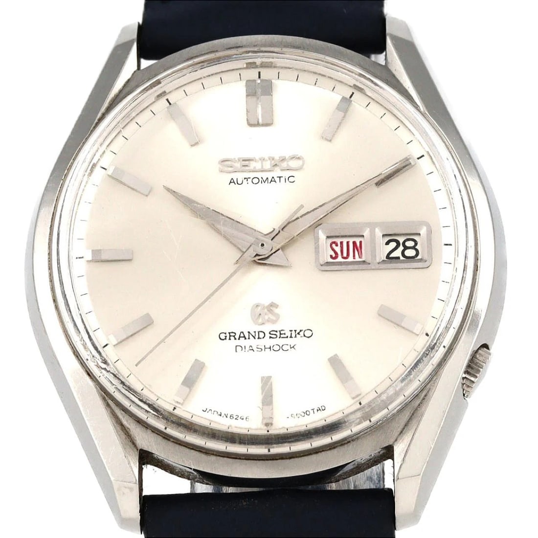 SEIKO GRAND STAINLESS WATCH: Seiko Grand StainlesS Watch Brand: SEIKO Type: Wrist watch Material: Case: Stainless Steel Bracelet: Strap Color: Dial Color: Silver Band Color: Blue Size: Case diameter: Approx. 36.5mm 