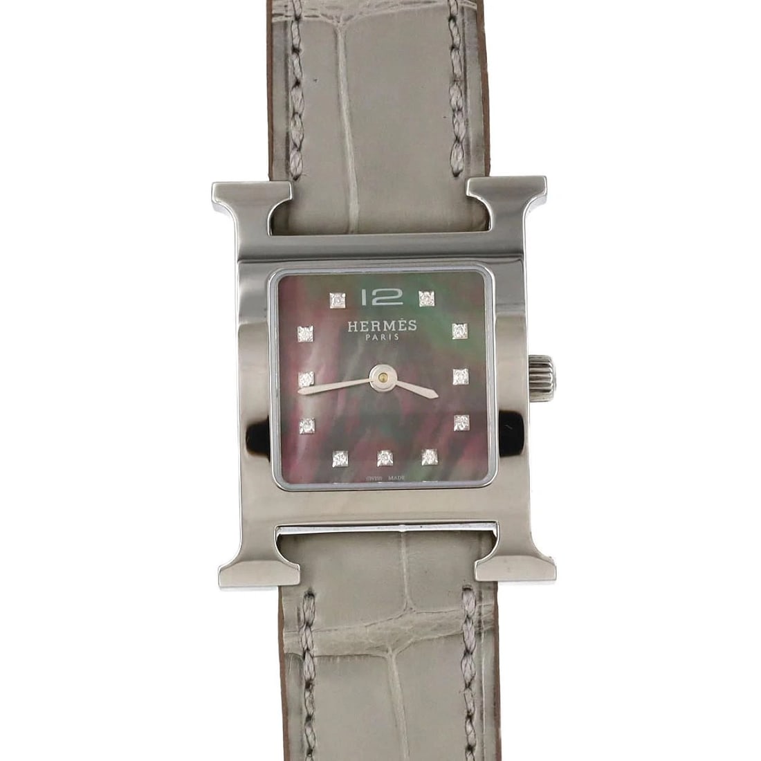 HERMÈS WATCH STAINLESS STEEL WATCH: Hermès Watch Stainless Steel Watch Brand: HERMES Type: Wrist watch Material: Case: Stainless Steel Bracelet: Strap Color: Dial Color: Black Shell/Diamond Band Color..... Size: Case diameter: 21x3