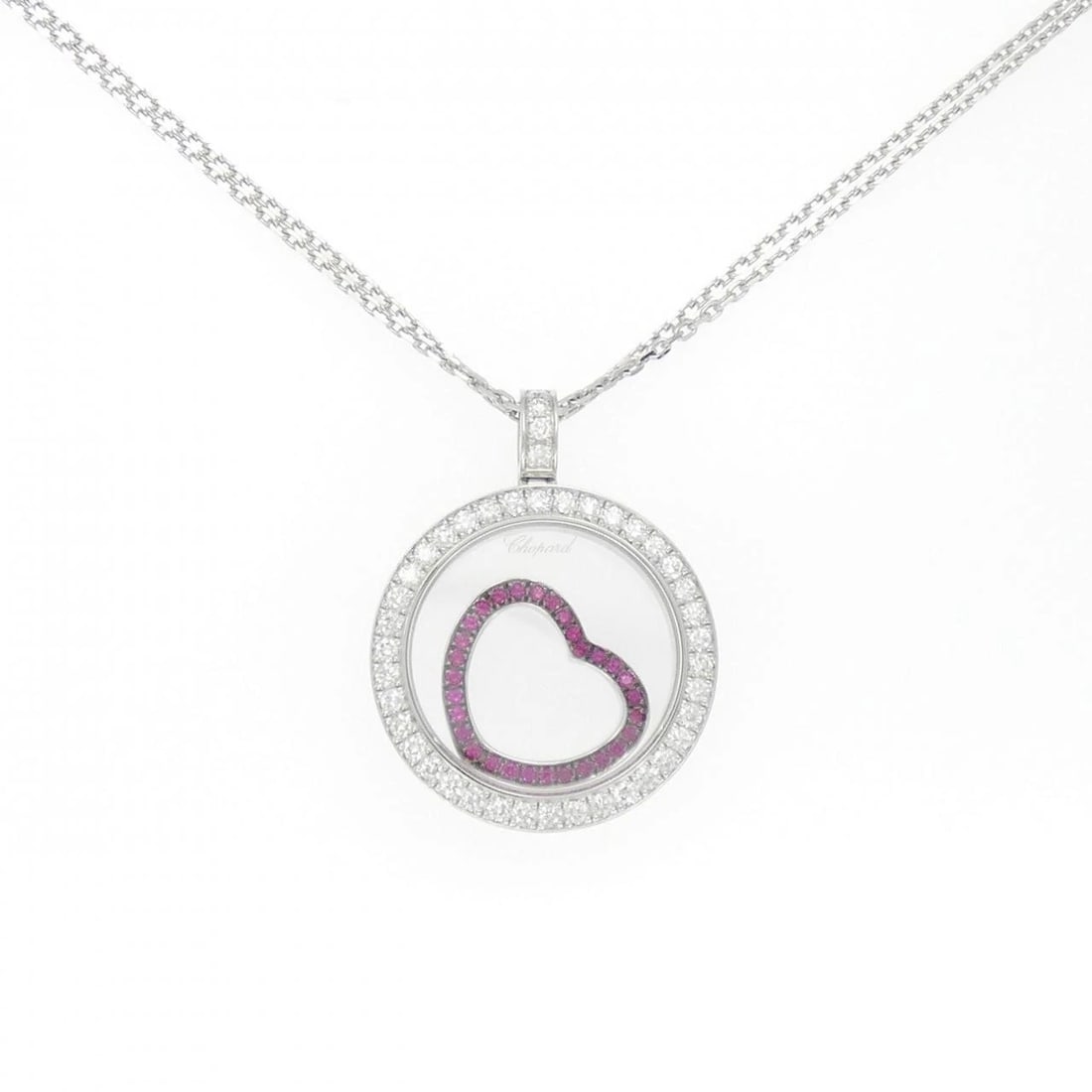 CHOPARD HAPPY DIAMONDS NECKLACE: Chopard Happy Diamonds Necklace Brand: Chopard Type: Necklace Material: 750 White Gold 750 Black Gold, Main Stone/Creation Ruby Color: none Size: 42cm,ActualSize Pendant top H x W: